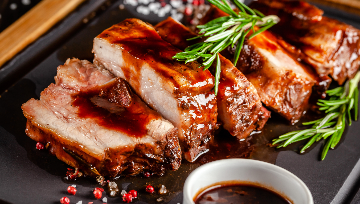 Pork roast marinated with siracha hot sauce, then served with an Asian-inspired sweet chili sauce for dipping, resulting in a savory and sweet custom flavor.